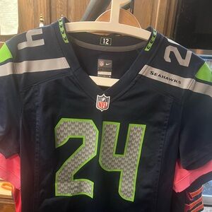 Nike NFL Seahawks Jersey with Number 24, Marshawn Lynch . Women’s small